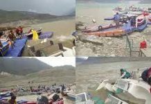 तेज तूफान के चलते टिहरी बांध की झील किनारे स्थित बोटिंग प्वाइंट में मची अफरातफरी