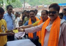 कांवड़ मेले के दृष्टिगत विष्णु घाट प्रांगण में परिचय पत्र वितरण कार्यक्रम आयोजित