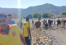 दशहरा पूजा के लिए गया युवक नदी में बहा,तलाश जारी